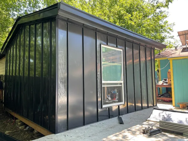 Black standing seam metal wall panels for Roof Inspection in Rockport